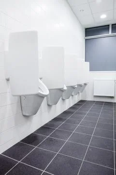 Urinal on the wall Stock Photos
