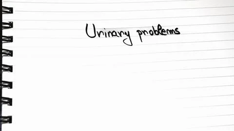 Urinary problems handwriting  text on paper, on office agenda. Copy space. Stock Photos