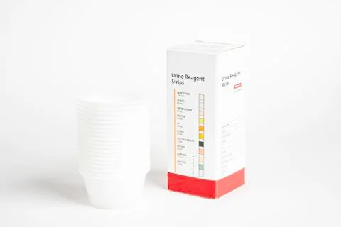 Urine Strips Box And A Stack Of Plastic Containers Stock Photos