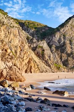 Ursa Beach coastline with rocks Stock Photos
