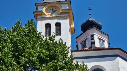 Ursuline Church of the Holy Trinity Clock and Bell Towers, Ljubljana Slovenia Stock Footage 343830950
