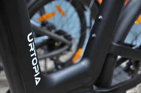 Urtopia logo on electric bicycle frame close-up Foto stock