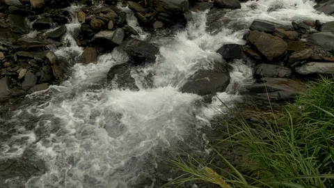 Urubamba river rapids and Machu Picchu Pueblo in the back, sacred valley, Cusco  Stock Footage 125278499