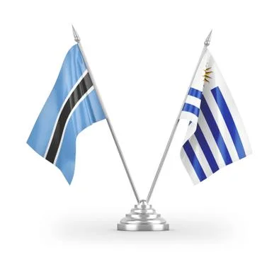 Uruguay and Botswana table flags isolated on white 3D rendering Illustrazione stock