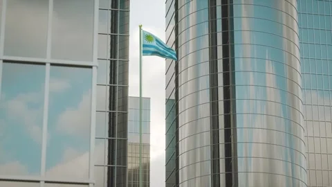 Uruguay Flag 3D Render Animation on Pole with City Buildings 스톡 동영상 332313501