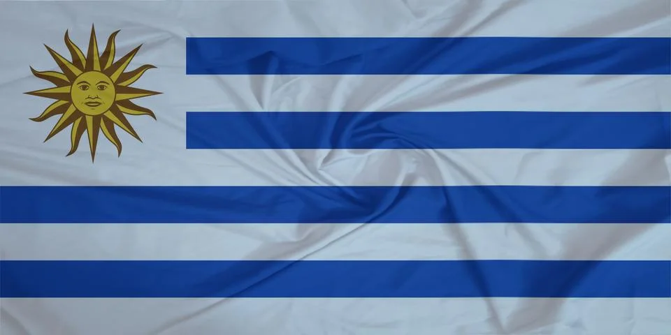Uruguay Flag fabric rippling in the wind Stock Photos