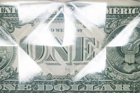 US 1 dollar banknote under transparent curved plastic Stock Photos