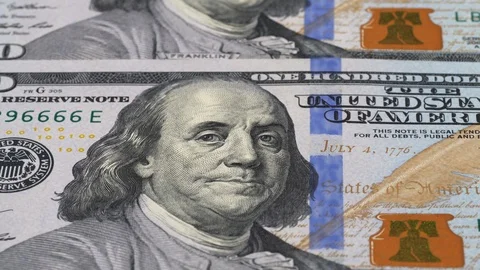 US 100 dollar bills close up tracking. Dolly shot, low angle. 4K Video stock 125447662