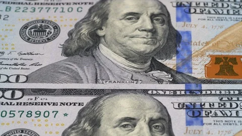 US 100 dollar bills close up tracking. Slider shot, low angle. 4K, 422 10 bit Stock Footage 125448516