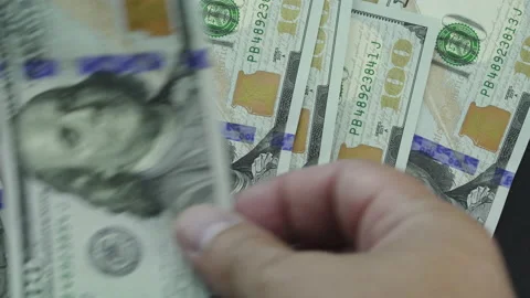 US 100 dollar bills man counting Stock Footage 201297703