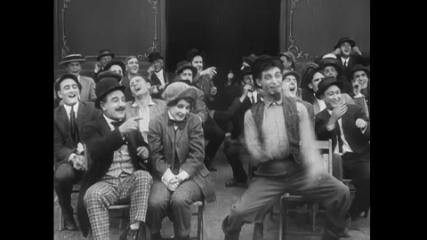 US - 1914 - in this silent comedy, a biased referee gets punched in a boxing Stock Footage 337953582