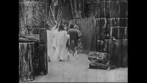 US - 1914 - in this silent fantasy, Patchwork Girl, Munchkin Boy, and friends Stock Footage 288081491