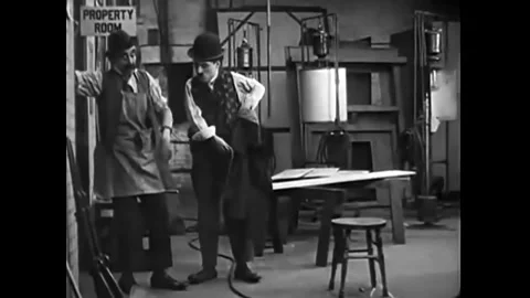 US - 1915 - in this silent comedy, an apprentice is so clumsy in a film set's 스톡 동영상 284855063