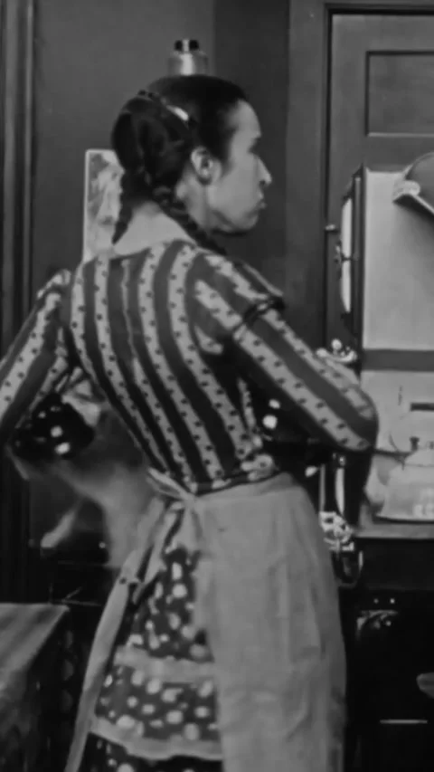 US - 1915, in this silent comedy, a servant complains to her boss about his Stock Footage 339113448
