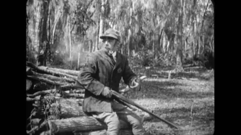US - 1916 - in this silent comedy, a hunter is caught hunting illegally. When a Stock Footage 272365083