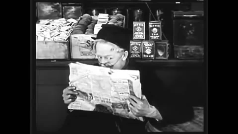 US - 1919 - in this silent comedy, an old man secretly eats cookies that are on Stock Footage 254198168