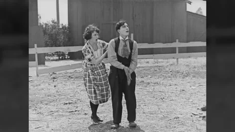 US - 1920 - in this silent comedy, an envious man uses paint to change the Stock Footage 325211471