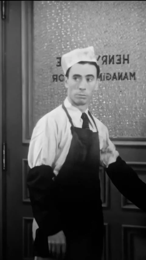 US - 1924 - in this silent comedy, a newspaper editor reacts enraged, throwing a Stock Footage 339806958