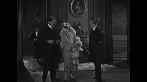 US - 1925 - in this silent comedy, a detective arrives at a wealthy residence Stock Footage 327681053