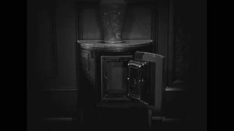 US - 1925 - in this silent comedy, a maid steals the diamond necklace that a Stock Footage 327683171