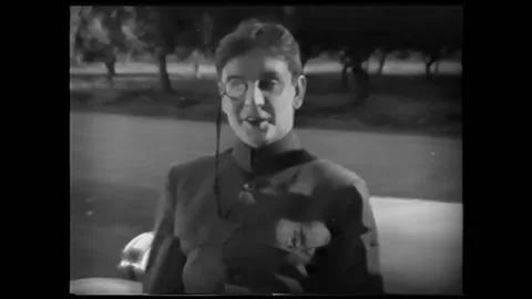 US - 1925 - in this silent comedy, a man punches another man's eyes, then steals Stock Footage 254191490