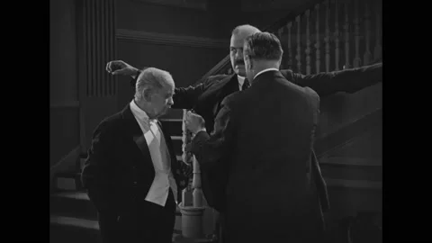 US - 1925 - in this silent comedy, a thief hides a package with a diamond Stock Footage 327680527