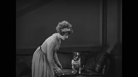 US - 1925 - in this silent comedy, a thief who poses as a detective informs an Stock Footage 327682833