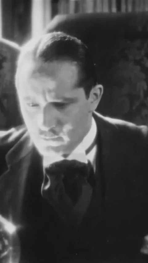 US - 1925 - in this silent drama, a psychic gazes into his crystal ball and sees Stock Footage 340195315