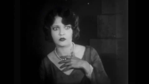 US - 1926 - in this silent comedy, when a butler falls down the stairs, he runs Stockbeeldmateriaal 327750806