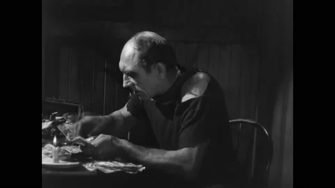 US - 1927 - in this silent comedy, a Capuchin monkey alerts a man who is Stock Footage 279780852