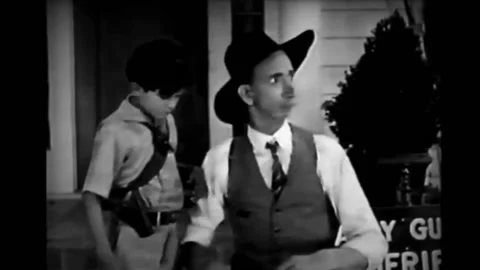 US - 1927 - in this silent comedy, something explodes behind a man. Angry, he Stock Footage 277298849