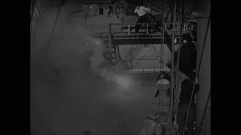 US - 1927 - in this silent drama, during a mutiny, the cruel captain shoots Stock Footage 327682199
