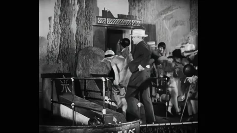 US - 1928 - in this comedy, people are having fun at a fair. A wind machine Stock Footage 288008128