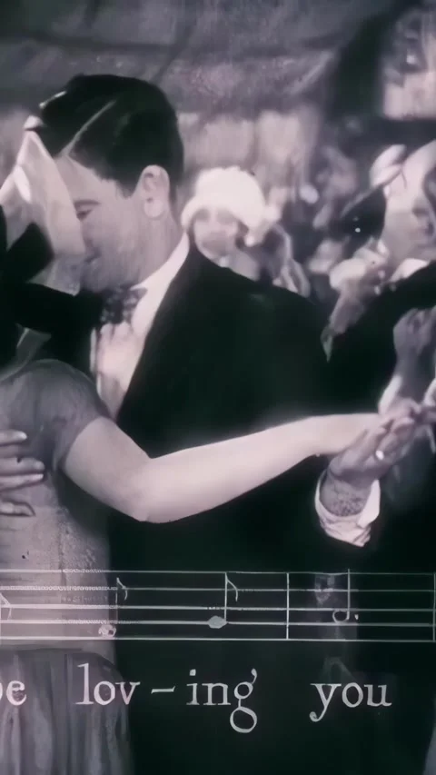 US - 1928 - in this romance, a couple dances on a large dancefloor to the music Stock Footage 339512040