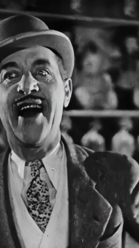 US - 1928 - in this romance, at a fair, a man throws balls at moving, fake cats Stock Footage 339512189