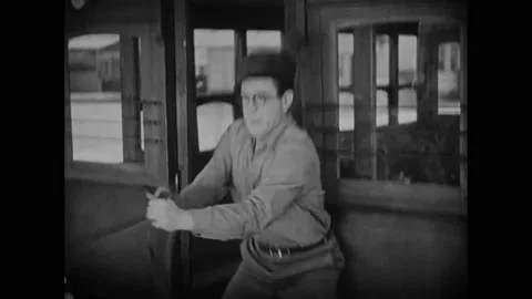 US - 1928 - in this silent comedy, Babe Ruth gets out of a cab after a fast, Stock Footage 288007480