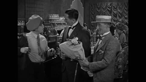 US - 1928 - in this silent comedy, Babe Ruth leaves a school full of excited Stock Footage 288008608