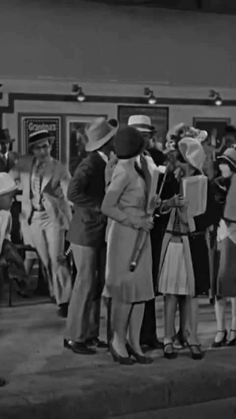 US - 1928 - in this silent comedy, a man hammers a hook into an amputeeﾫs wooden Stock Footage 339499894