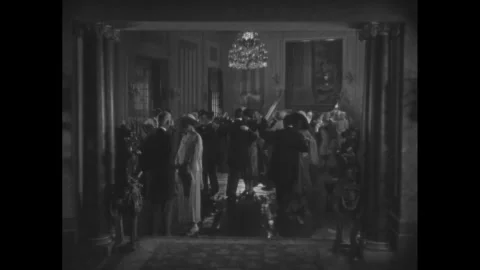 US - 1928 - in this silent comedy, a man's hand is caught in another's pocket on Stock Footage 341341111