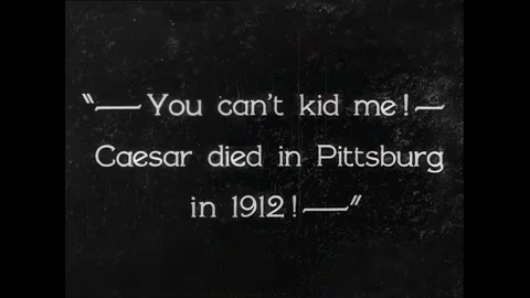 US - 1928 - in this silent comedy, parents dressed like Romans, and their Stock Footage 296409689