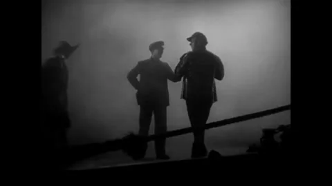 US - 1928 - in this silent drama, a dock worker carries an unconscious woman he Stock Footage 328181231