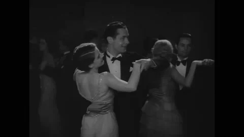 US - 1929 - in this romance, a man interrupts his dance with his date and takes Stock Footage 323079677