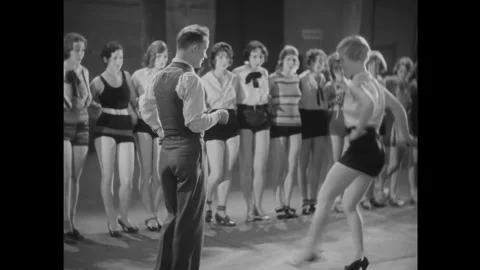 US - 1929 - in this silent drama, after a choreographer fires a chorus dancer, Stock Footage 337969233
