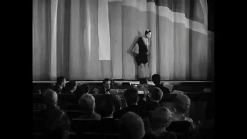 US - 1930 - in this comedy, after her performance, a singer brings the composer Stock Footage 325206171