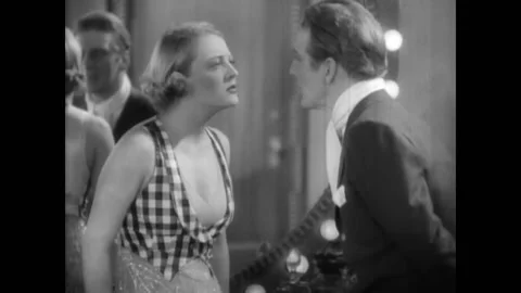 US - 1930 - in this comedy, a Broadway star argues with her ex-boyfriend in her Stock-Footage 323262208