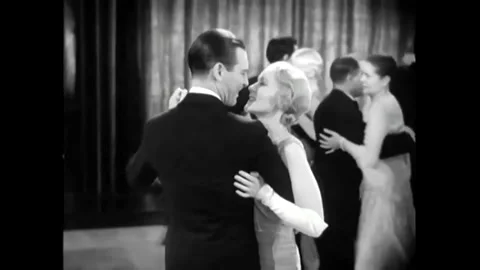 US - 1930 - in this comedy, a couple dances on the dancefloor while another Stock Footage 325202092