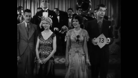 US - 1930 - in this comedy, a couple wins a cup in a dance contest. The woman's Stockbeeldmateriaal 325206747