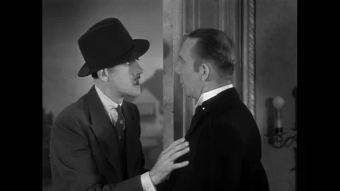 US - 1930 - in this comedy, a man arrives at a party, relieved to see only men Stock Footage 325201763