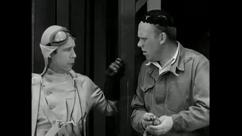 US - 1930 - in this comedy, a plane mechanic gives a nervous fake pilot Stock Footage 340582467