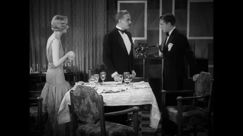 US - 1930 - in this comedy, a rich, drunk man confronts his father when the Stock Footage 337947404
